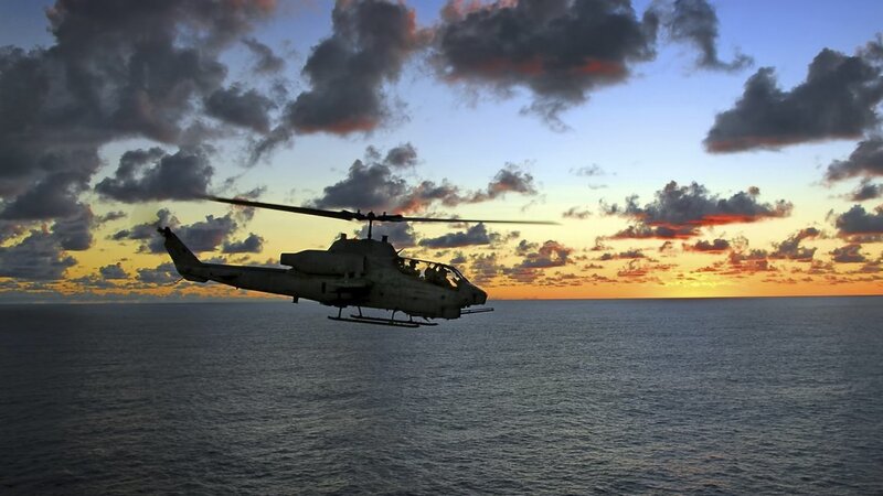 Military Helicopter over Ocean — Blue, Dramatic
