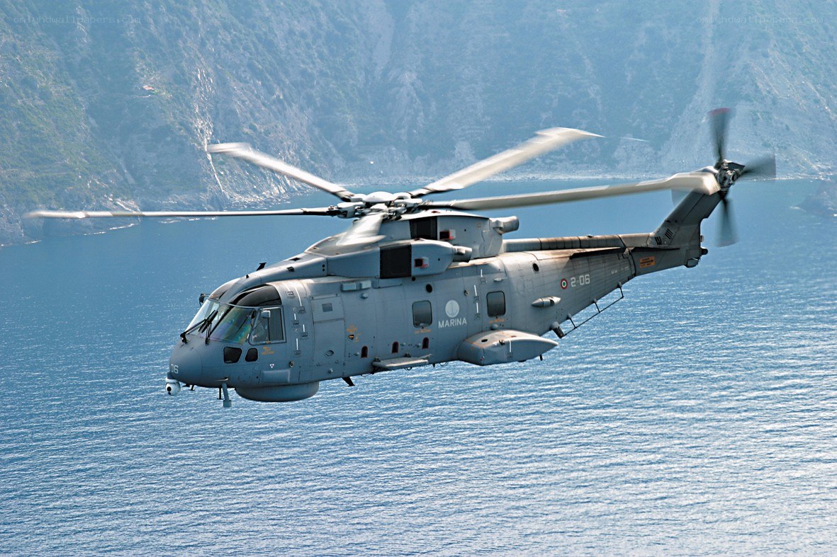 Military helicopter over sea