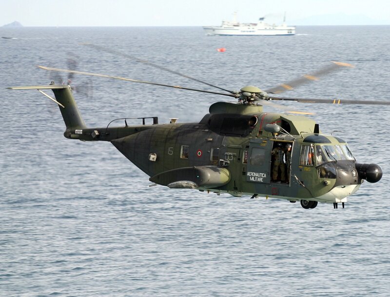 Military helicopter over the sea