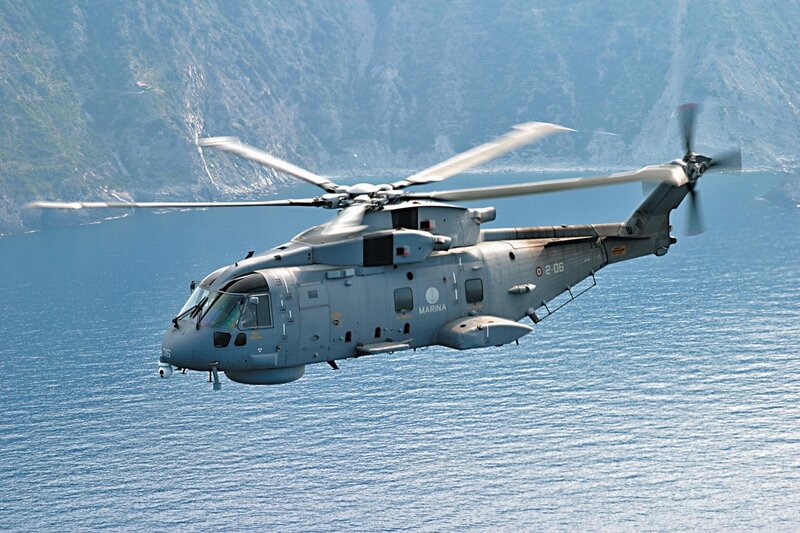 Military Helicopter over Water — Gray, Calm, Afternoon