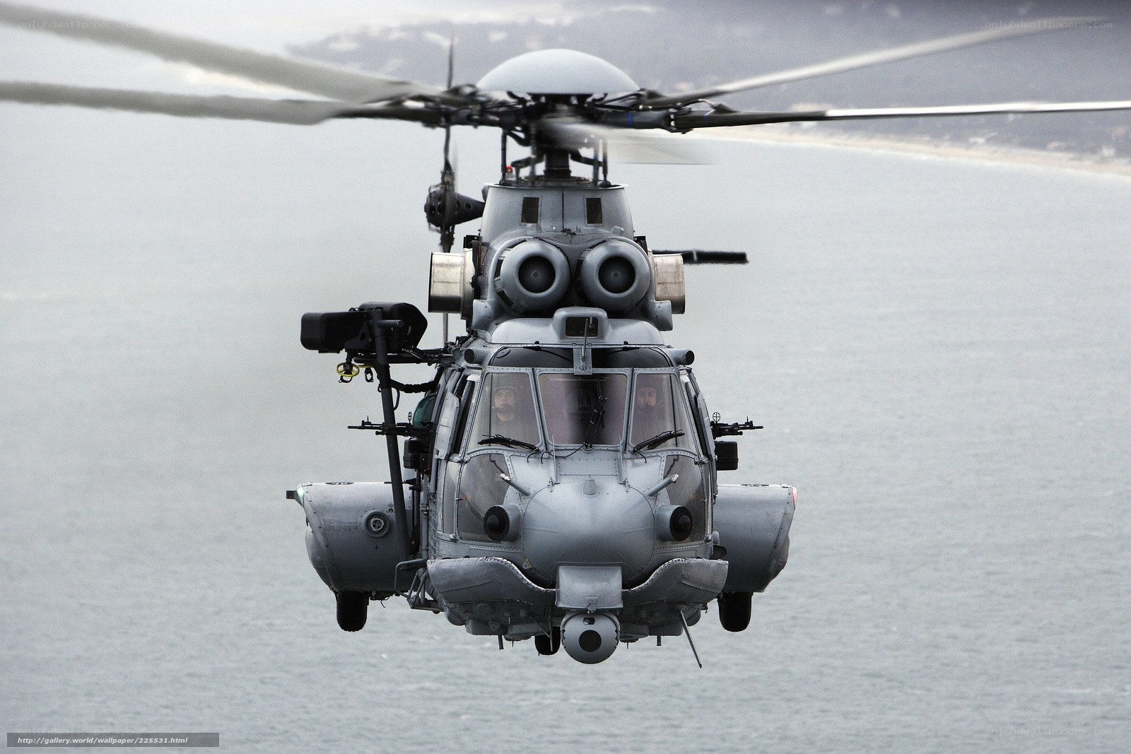 military helicopter over water