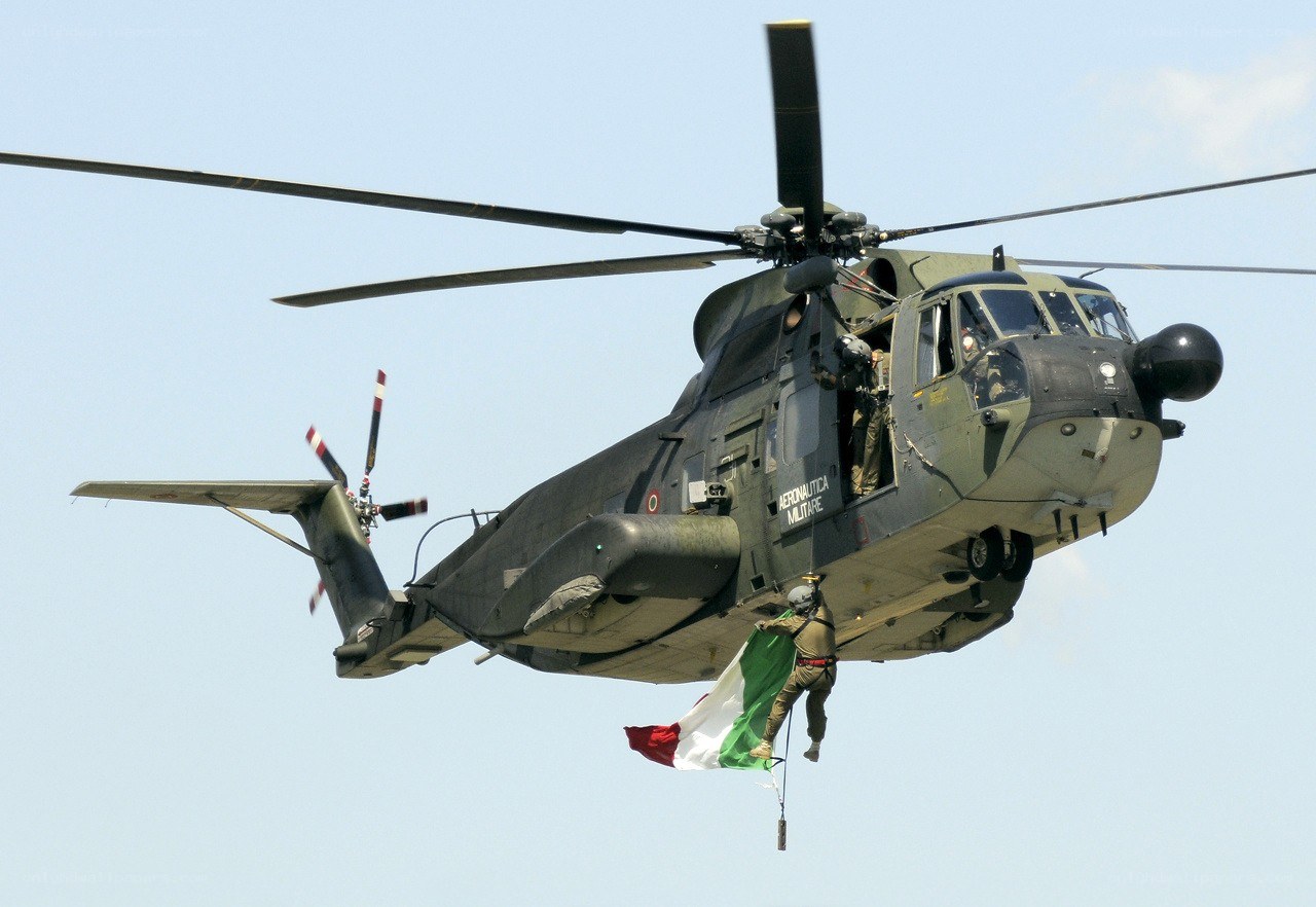 Military helicopter with flag