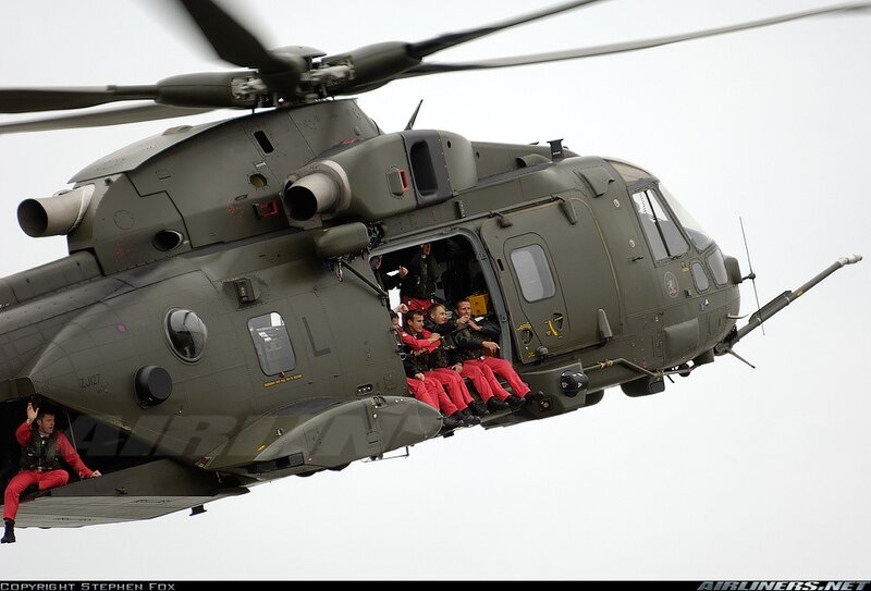 Military helicopter with personnel