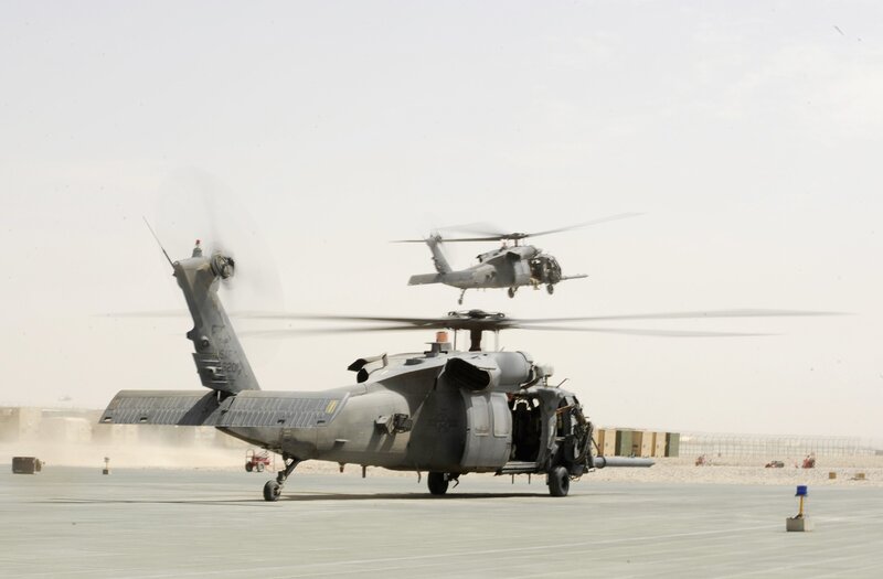 Military helicopters at airfield