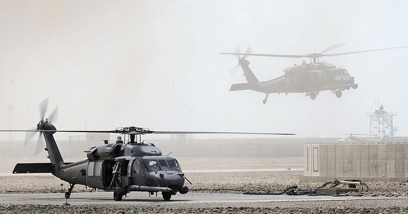 Military helicopters at airfield