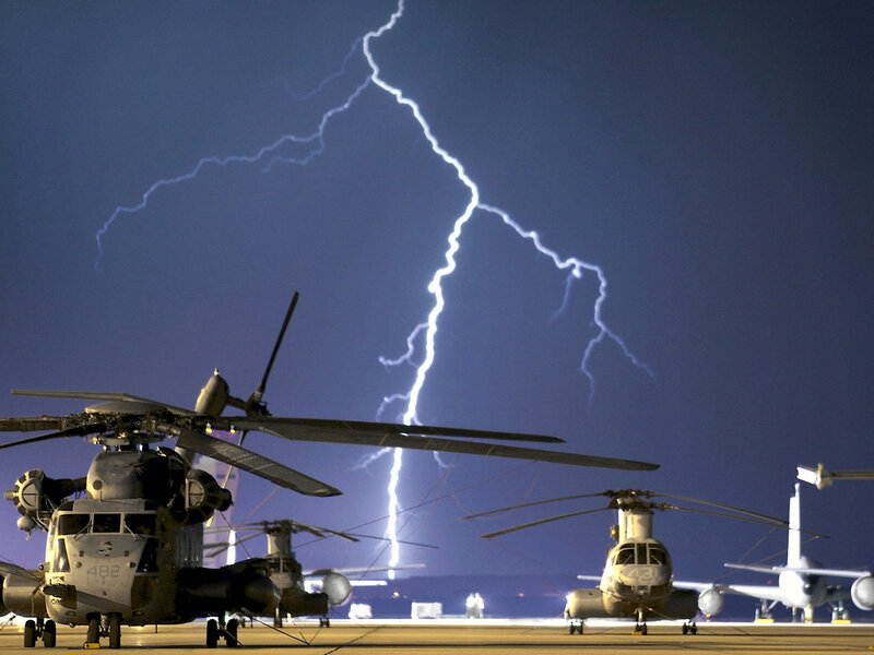 Military Helicopters at Night — Blue