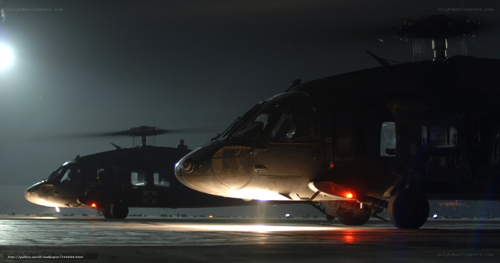 Military helicopters at night