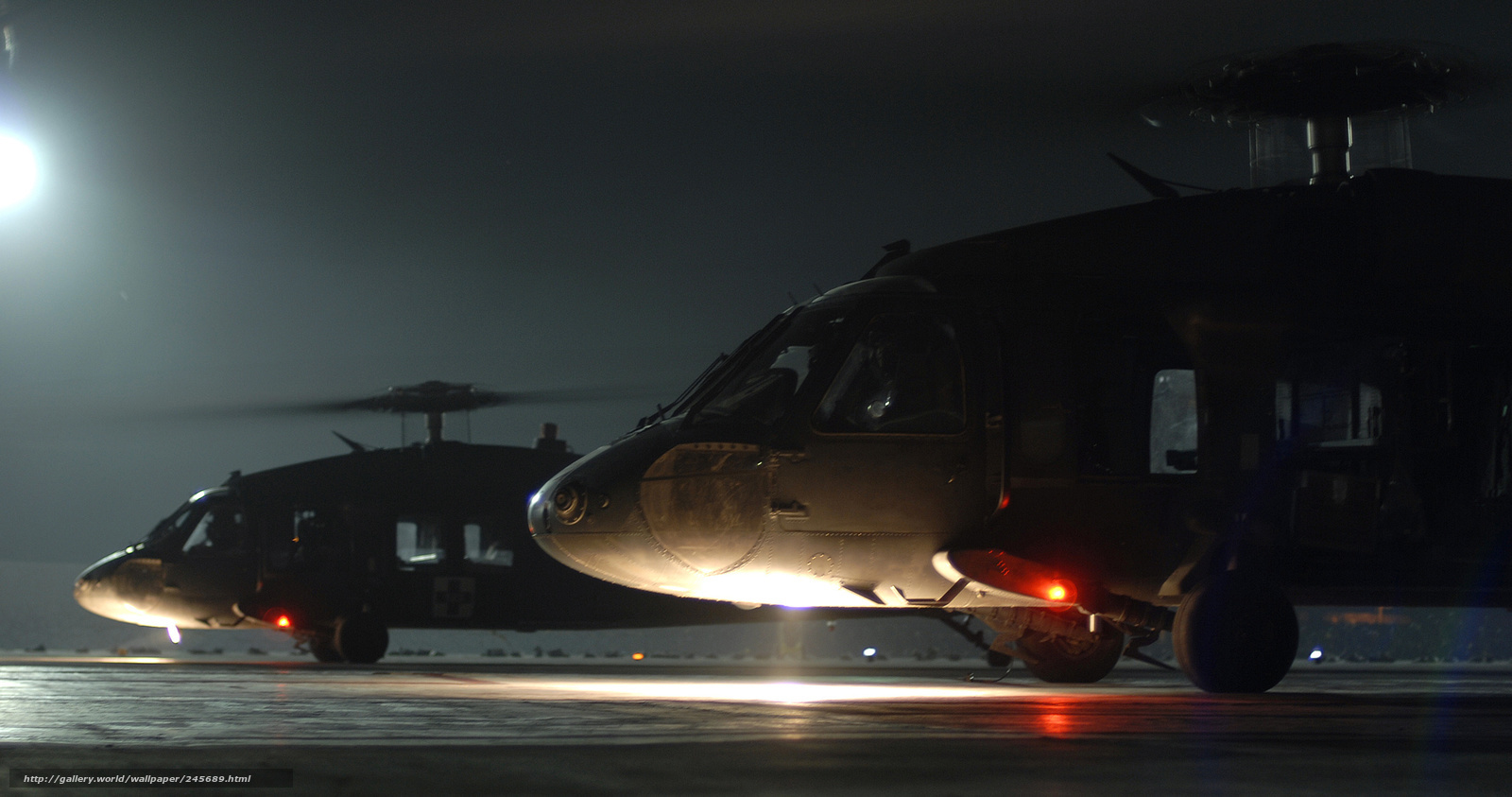 Military helicopters at night