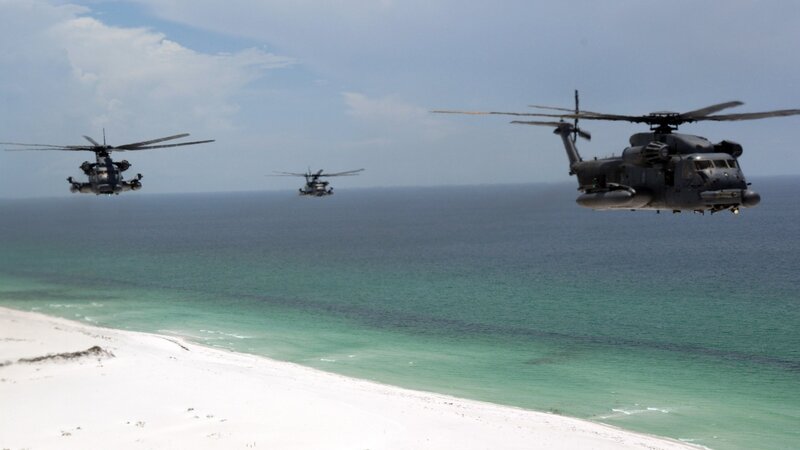 Military Helicopters Flying — Blue