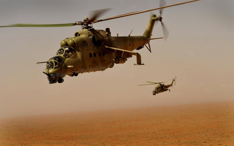 Military helicopters in desert