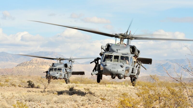 Military helicopters in desert