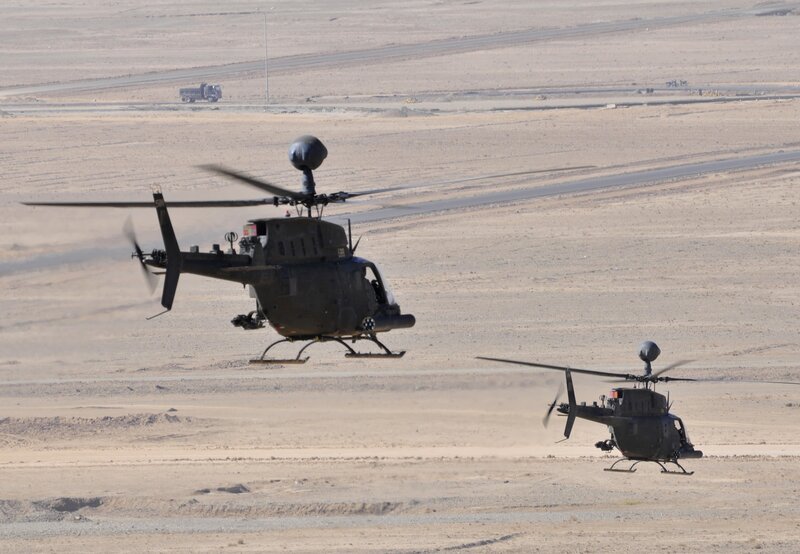 Military helicopters in desert