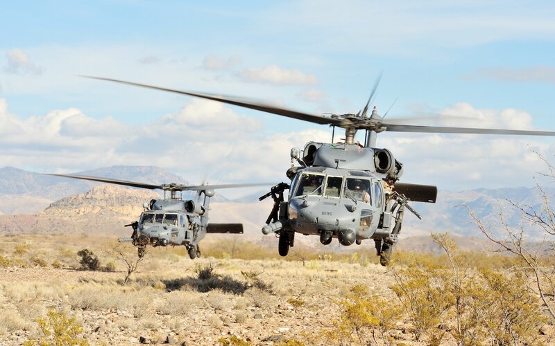 Military helicopters in desert