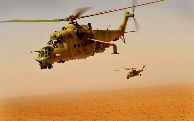 Military helicopters in desert