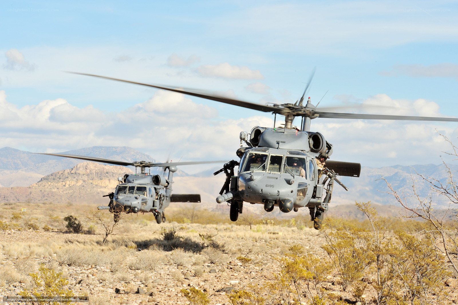 Military helicopters in desert