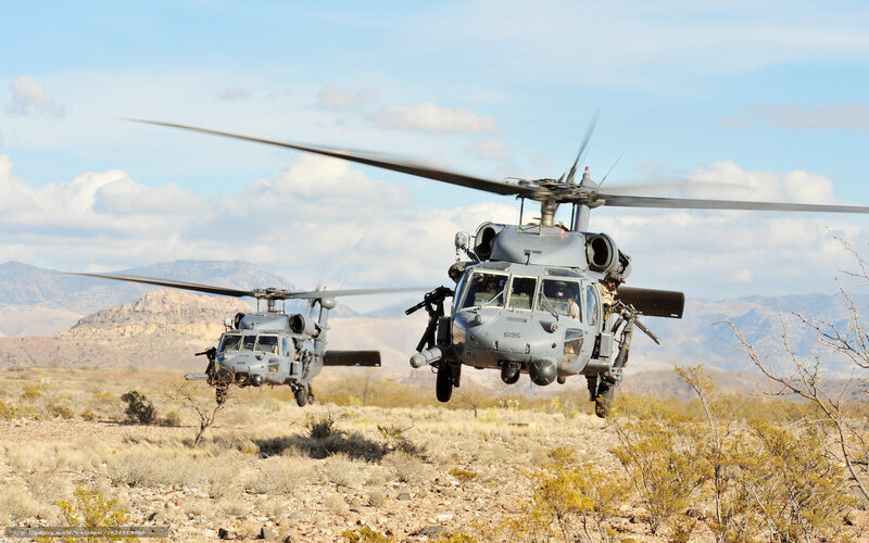 Military helicopters in desert