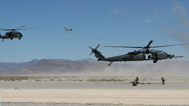 Military helicopters in desert operation