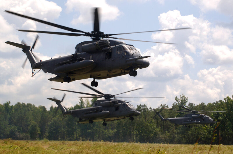 Military helicopters in flight