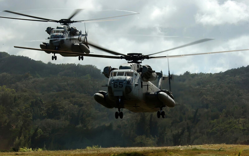 Military helicopters in flight