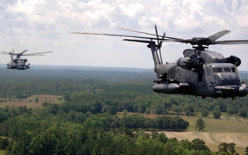 Military helicopters in flight