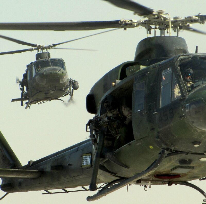 Military helicopters in flight