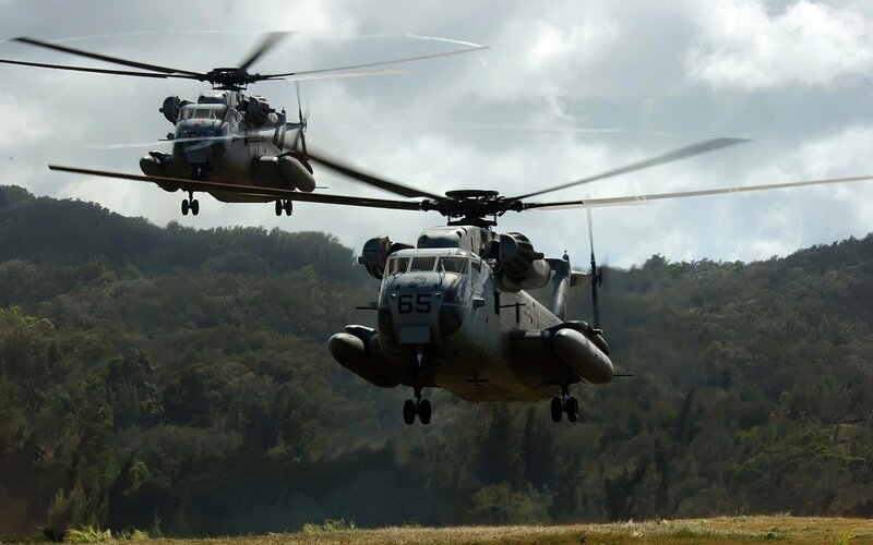 Military helicopters in flight