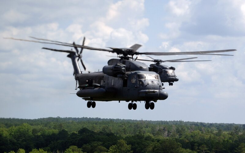 Military helicopters in flight