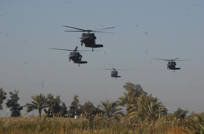 Military helicopters in flight