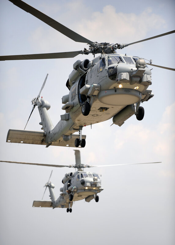 Military helicopters in flight