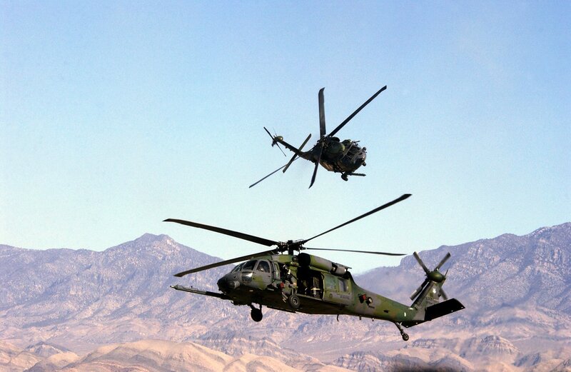 Military helicopters in flight