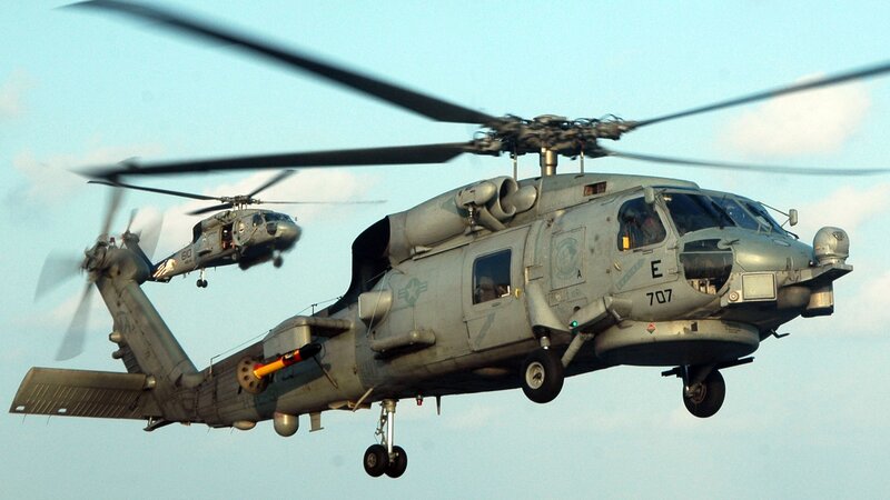 Military helicopters in flight