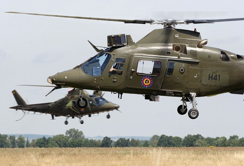 Military helicopters in flight