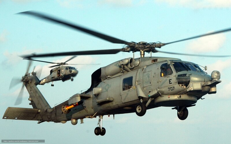 Military helicopters in flight