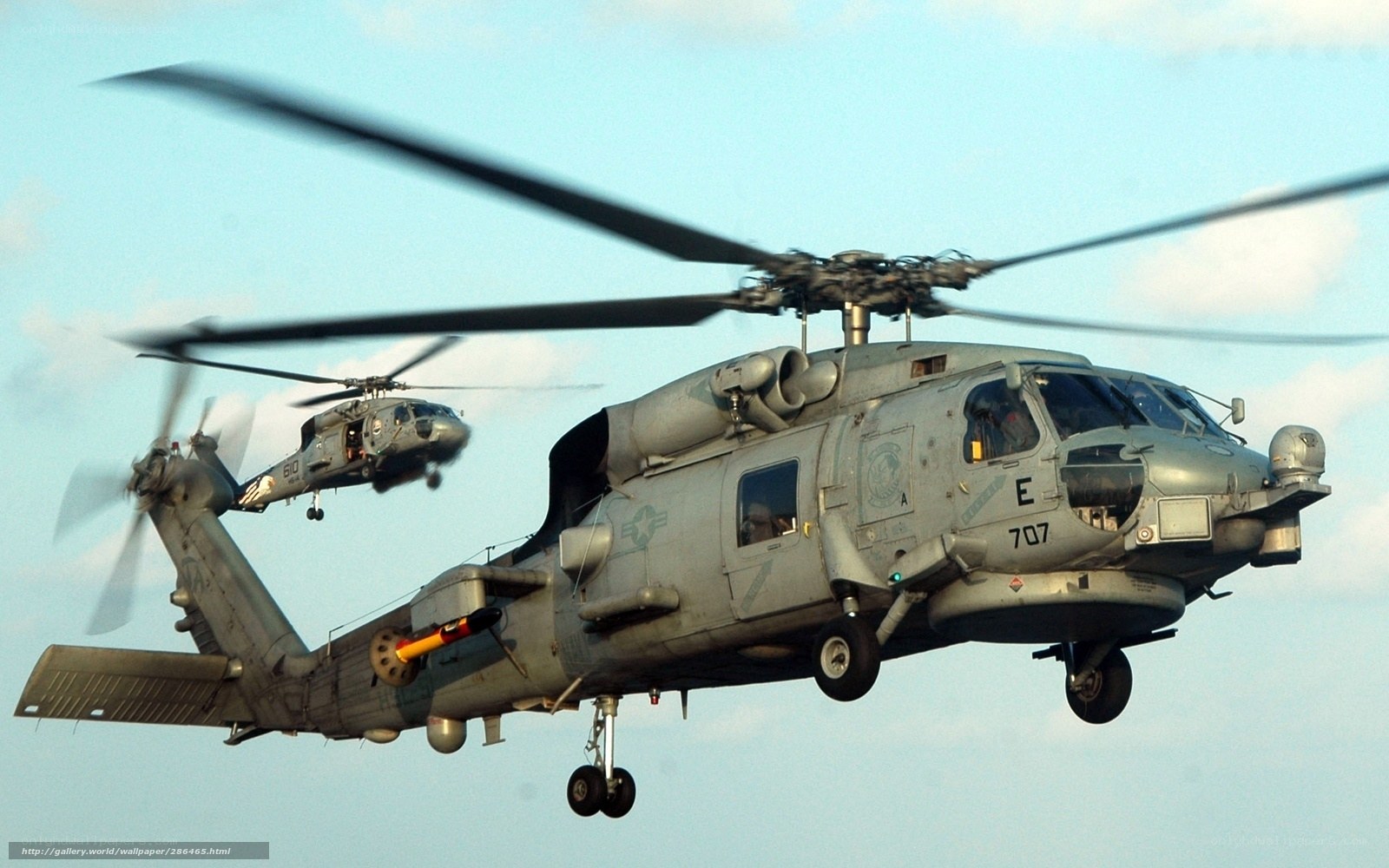 Military helicopters in flight
