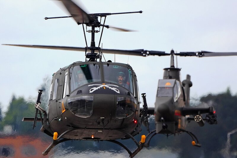 Military Helicopters in Flight — Green, Dramatic, Photograph