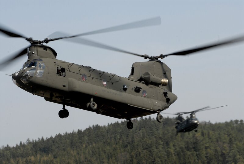 Military Helicopters in Flight — Green, Dynamic, Afternoon, Photograph, Forest