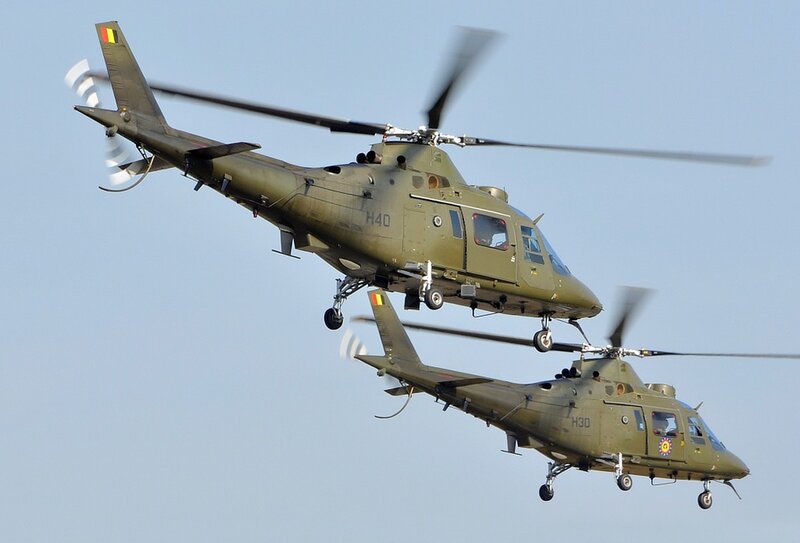 Military Helicopters in Flight — Green, Dynamic, Afternoon, Photograph, Sky, Wheels, Blue