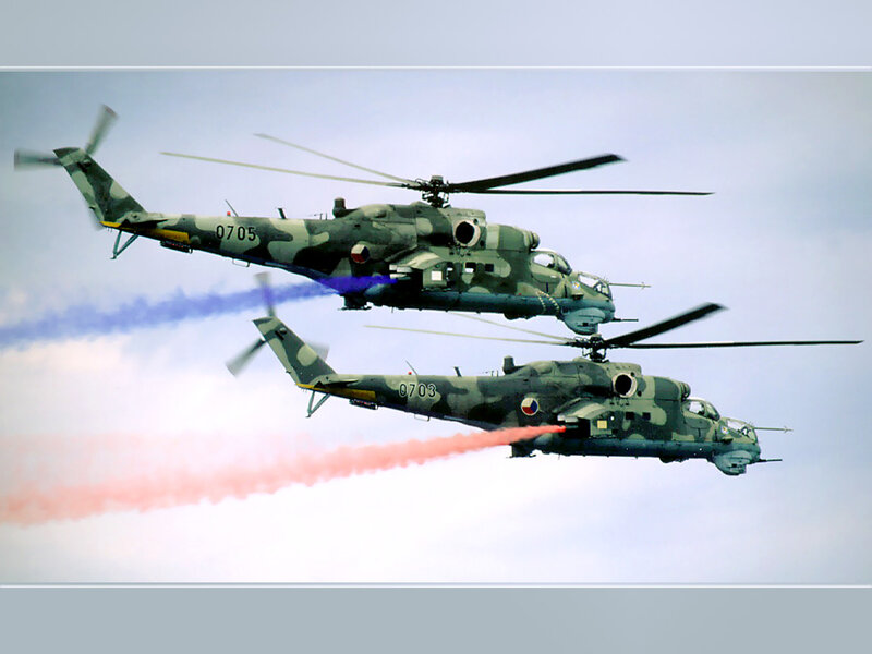 Military Helicopters in Flight — Green, Dynamic, Photograph