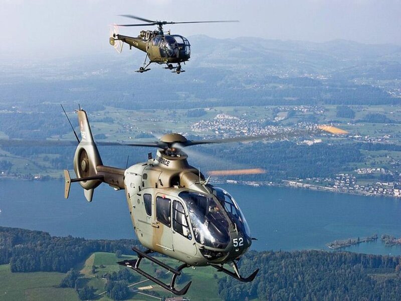 Military Helicopters in Flight — Green