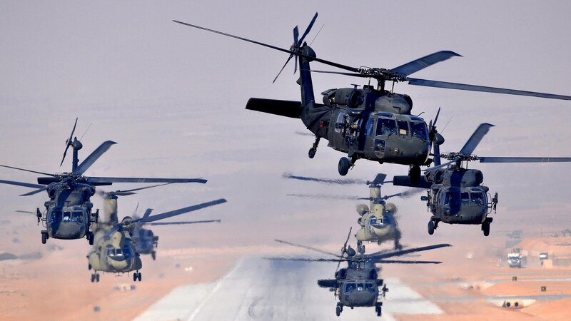 Military helicopters in formation