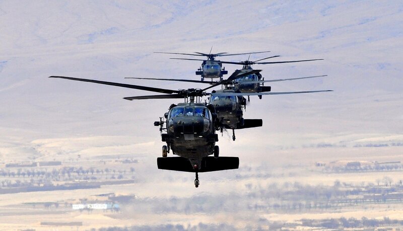 Military helicopters in formation