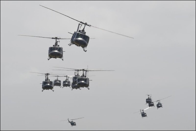 Military Helicopters in Formation — Gray, Dramatic, Photograph