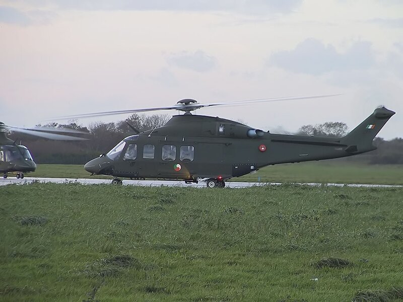 Military helicopters on a runway
