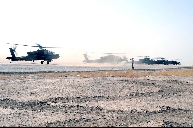 Military helicopters on a tarmac