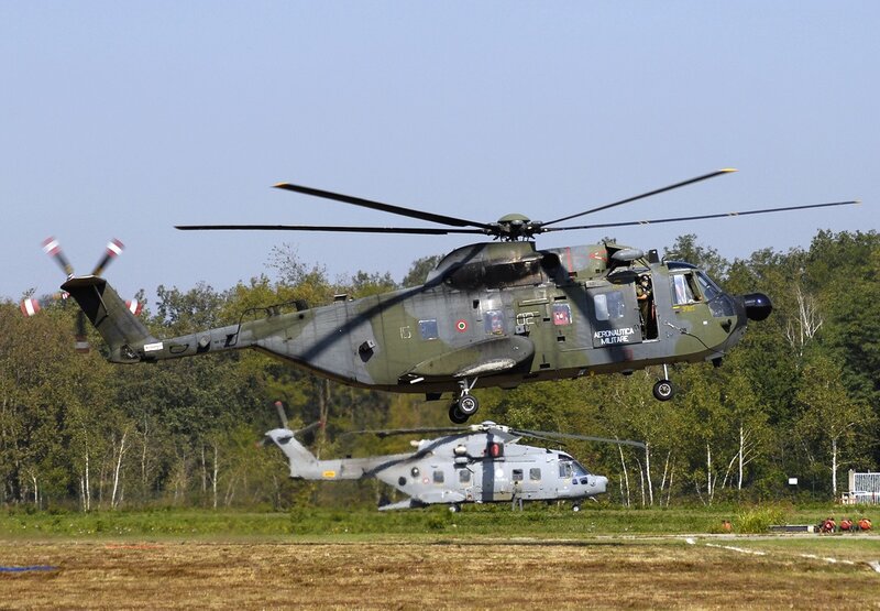 Military helicopters on airfield