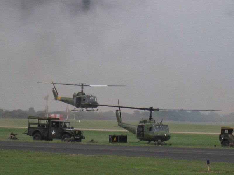 Military Helicopters on Airfield — Green
