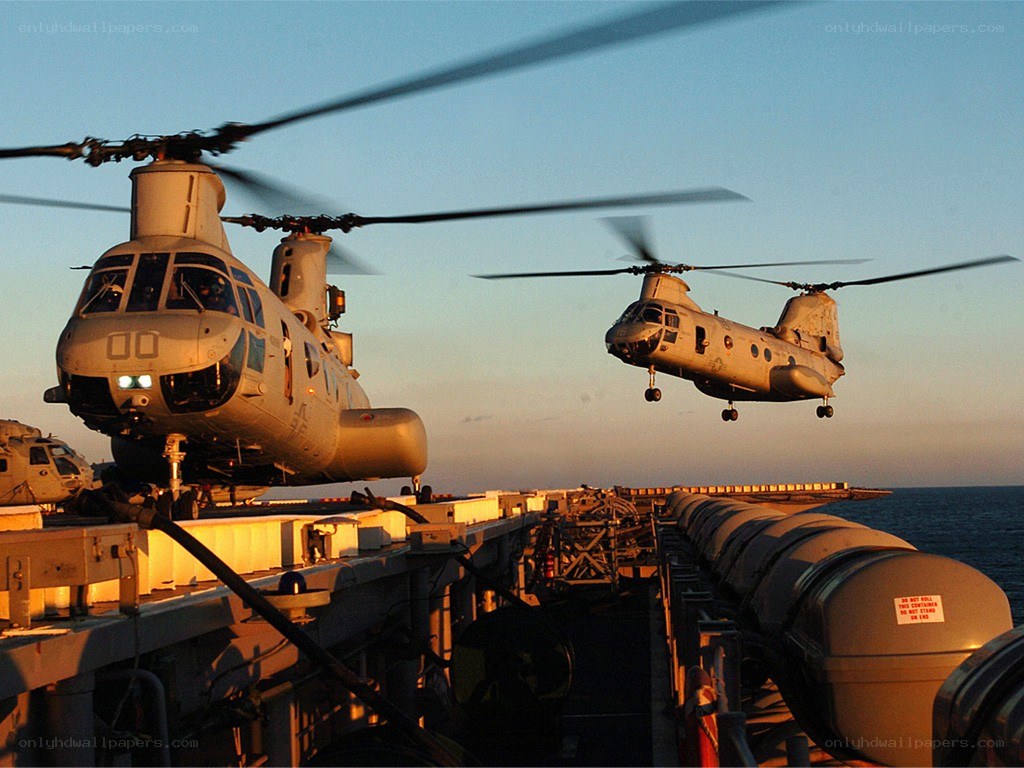 Military helicopters on ship deck