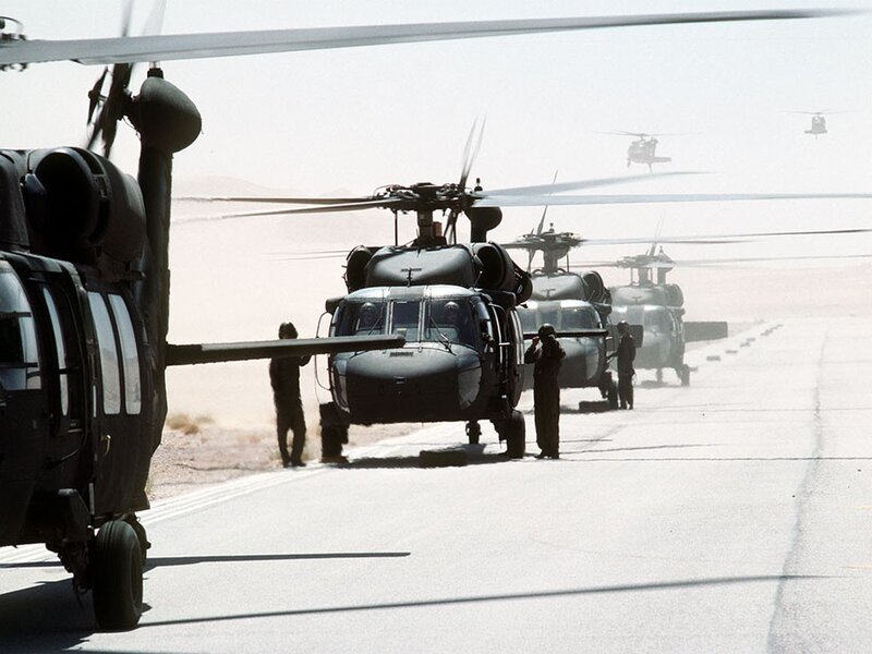 Military helicopters on tarmac