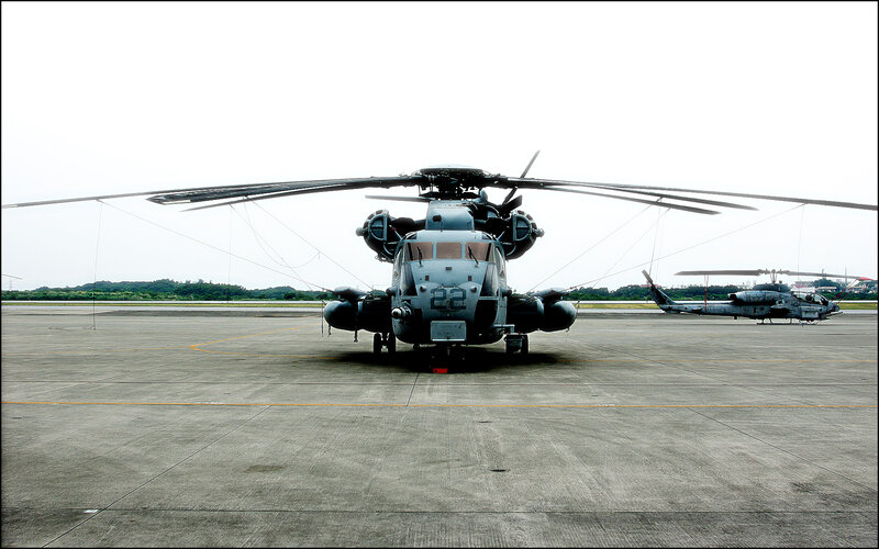 Military helicopters on tarmac