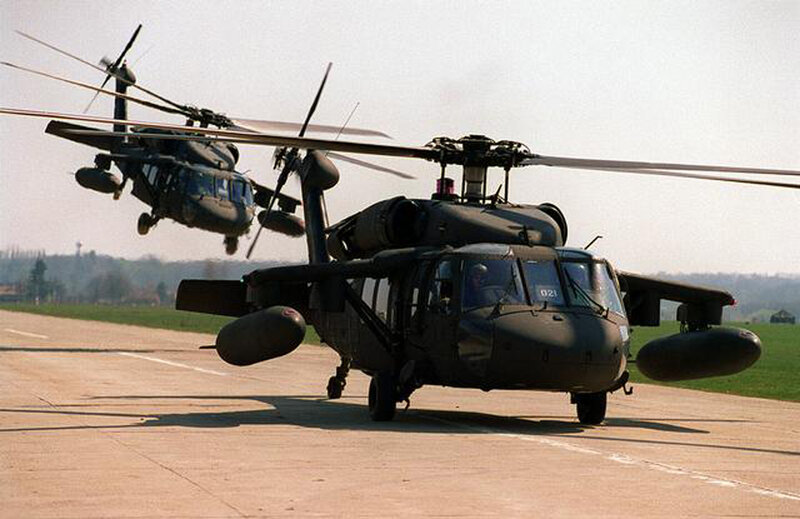 Military helicopters on tarmac